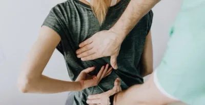 How to Treat Back Pain at Home — District Wellness